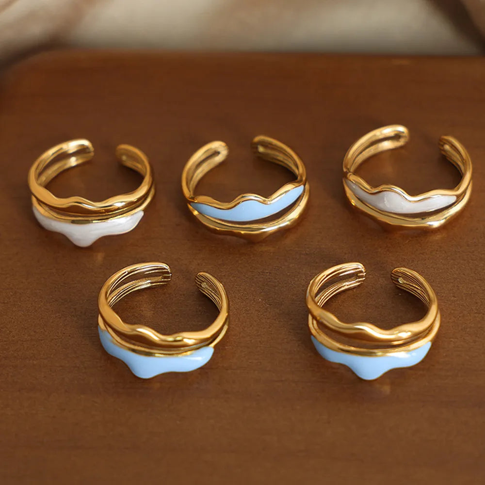 Vibrant Blue Enamel and Gold-Tone Ring, A Playful Accessory for Any Style